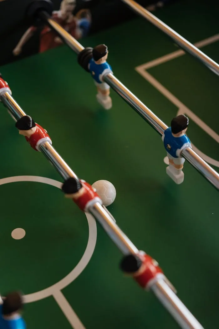 Close-up of foosball players on a table