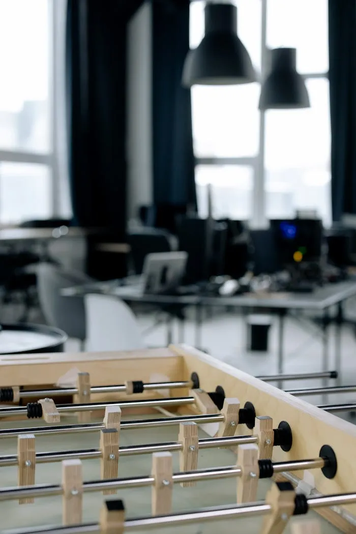A budget foosball table set up in a room